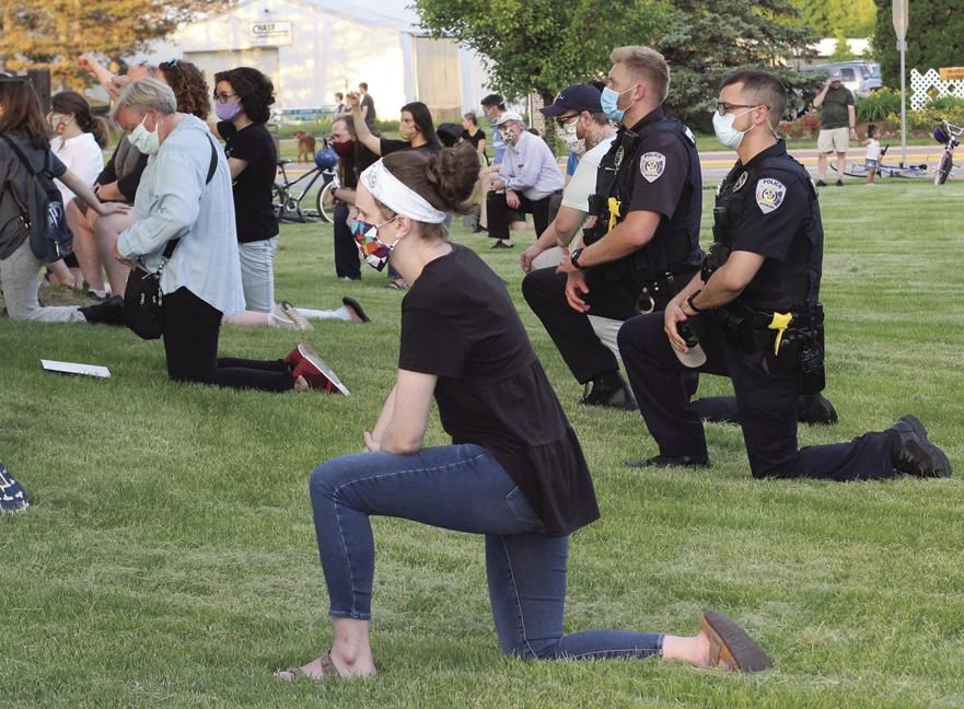 BLM event / Officers kneel